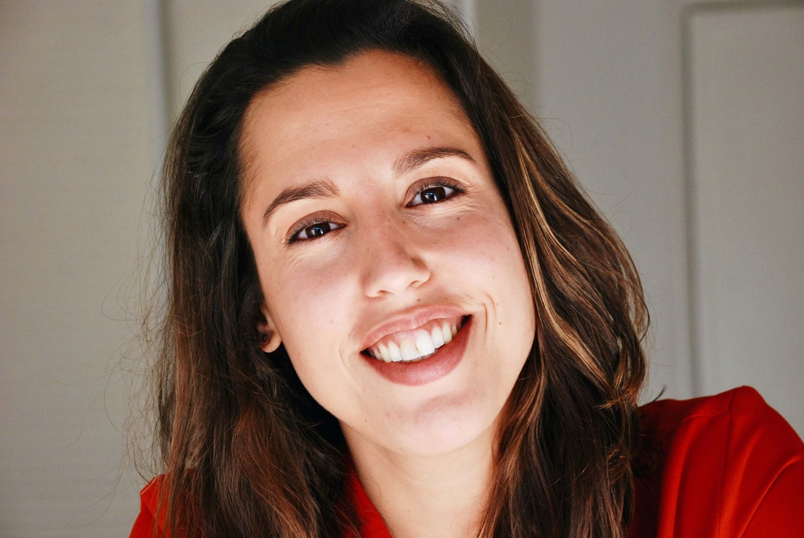 A photo of woman in red